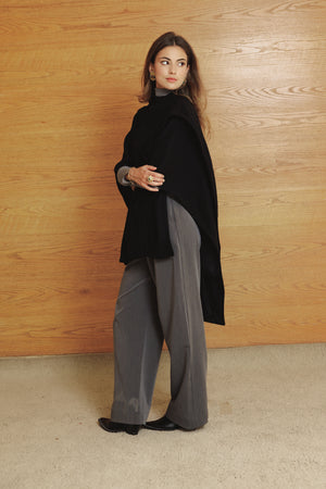 Asymmetric Cape in Black